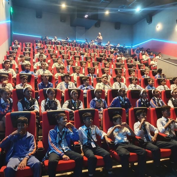 Students from Moonlight School enjoying the movie